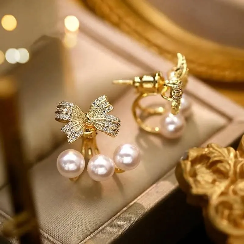 Pinapes crystal studded bow shaped stud pearl drop earrings for women